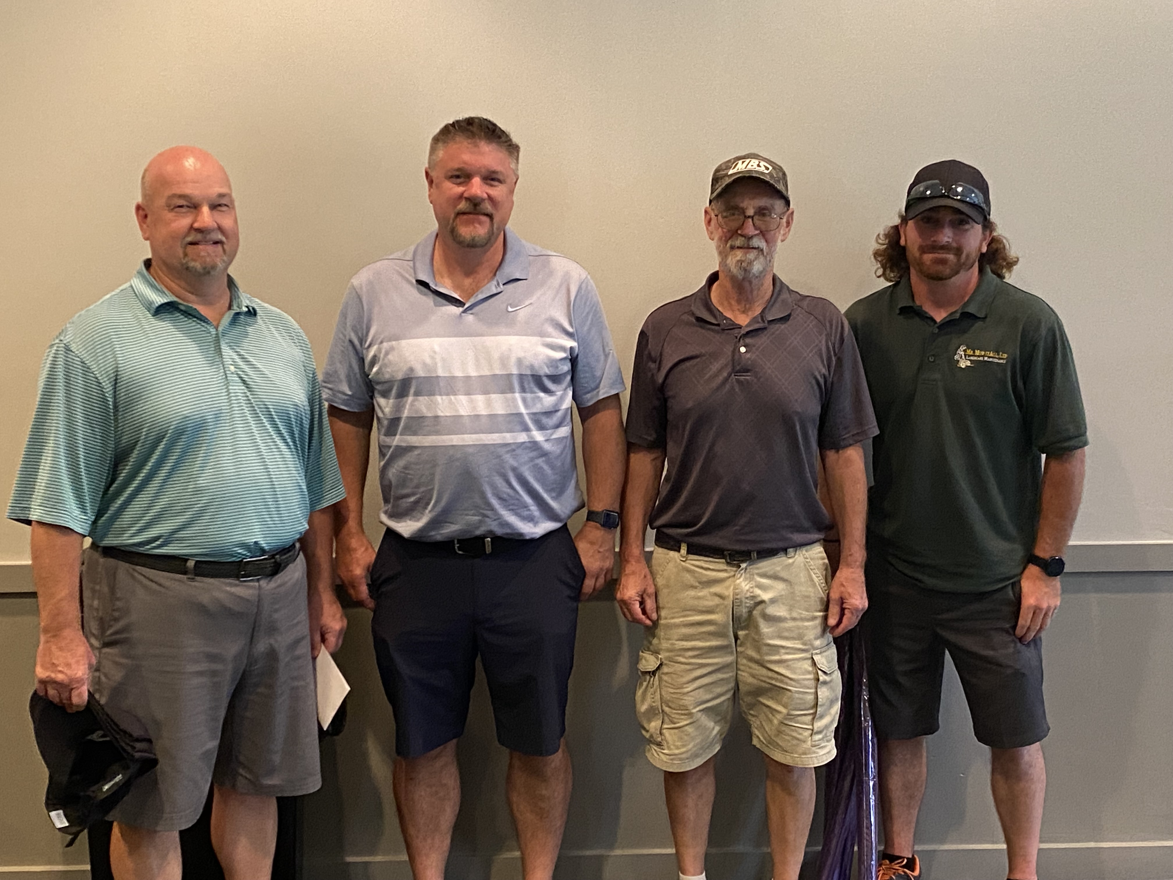 Four golfers